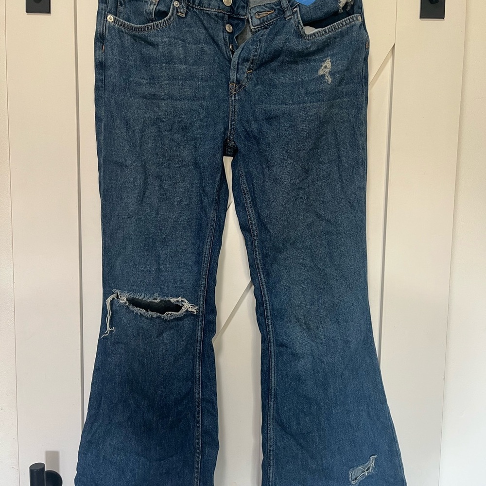 Free People 
We The Free Flare Jeans in Distressed Blue.
